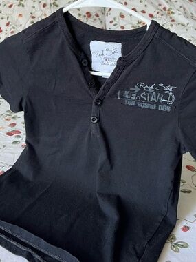 rock star black button baby tee